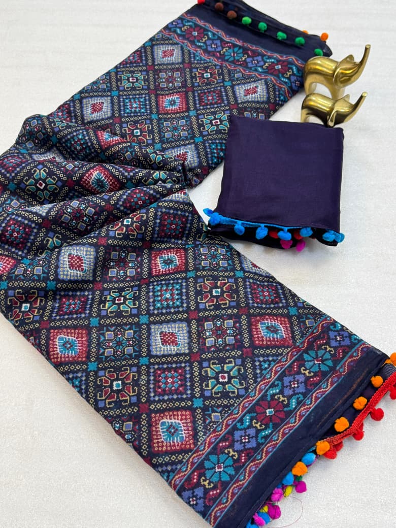 Mul Mul Soft Cotton Ikkat Print Saree with Pom Pom Border & Running Blouse – Playful Heritage for Boutique Displays & Festive Gifting