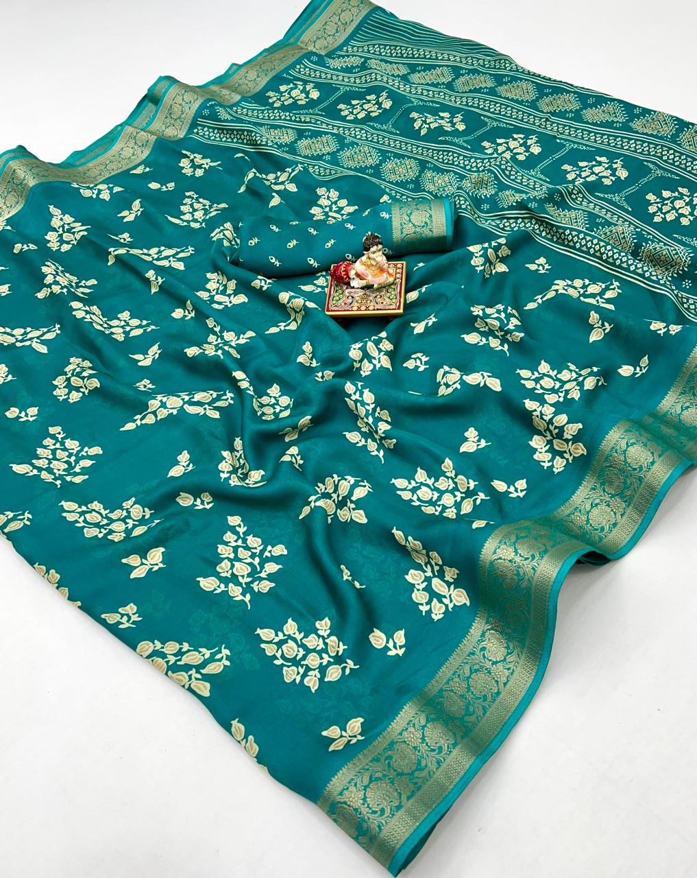 Pure Calcutta Moss Mellow Georgette Sarees with Exclusive Prints & Zari Woven Border