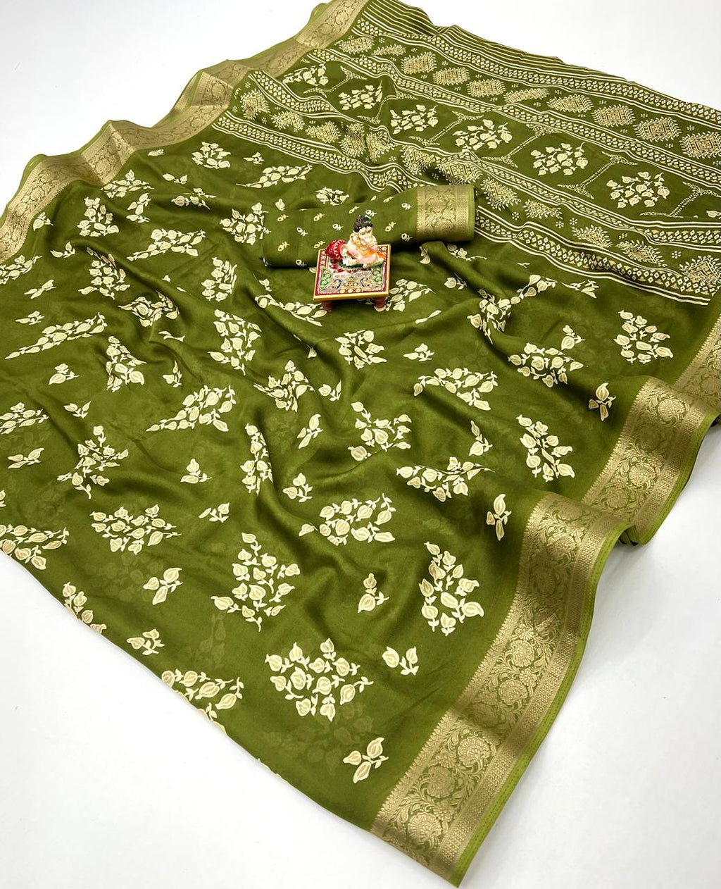 Pure Calcutta Moss Mellow Georgette Sarees with Exclusive Prints & Zari Woven Border
