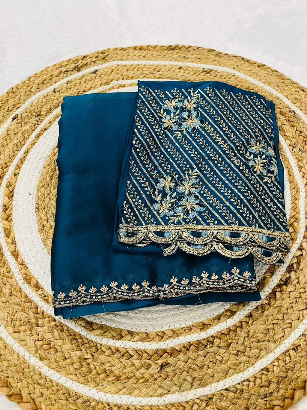 Graceful Rangoli Fabric Saree with a neat finish and comfortable drape