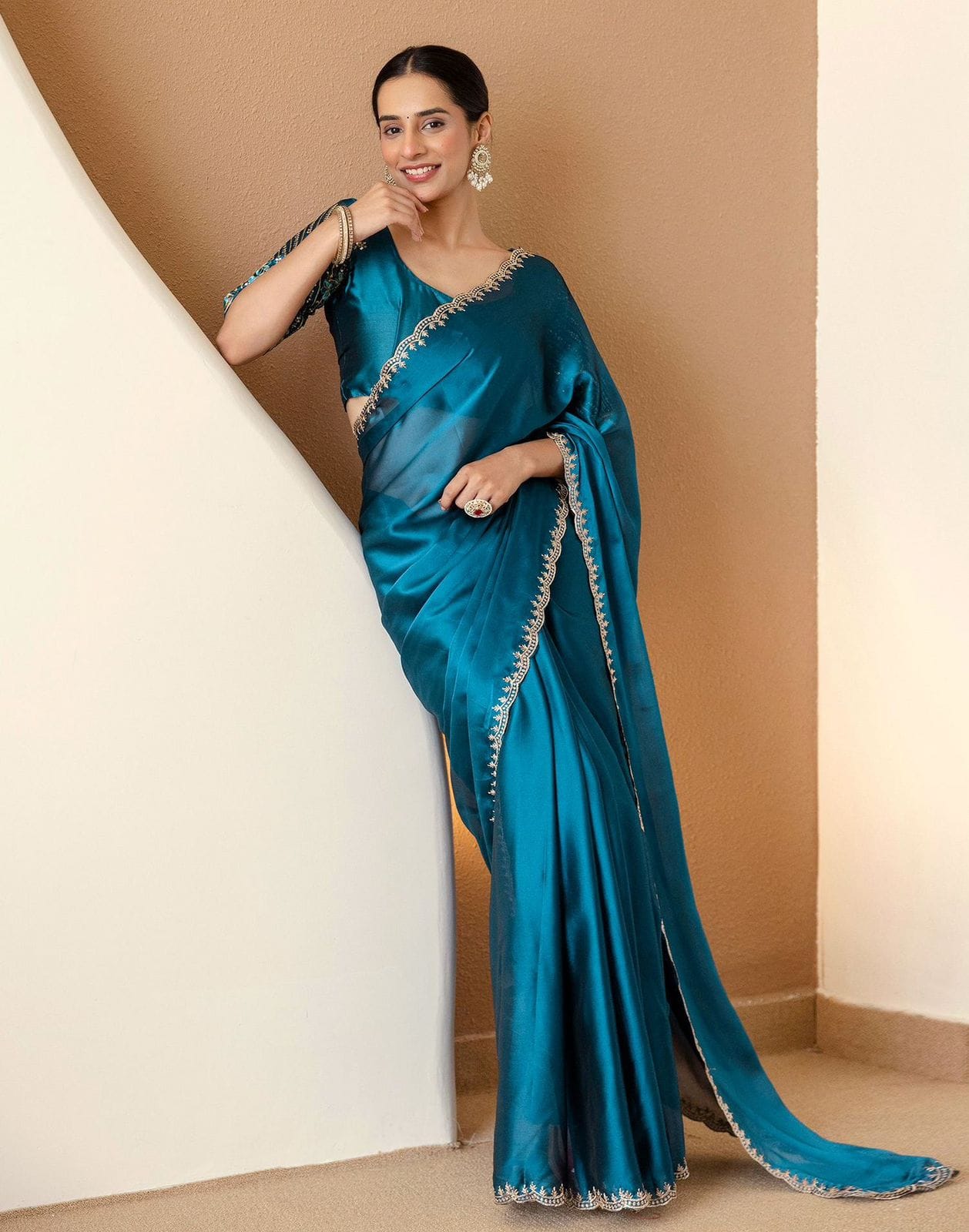 Graceful Rangoli Fabric Saree with a neat finish and comfortable drape