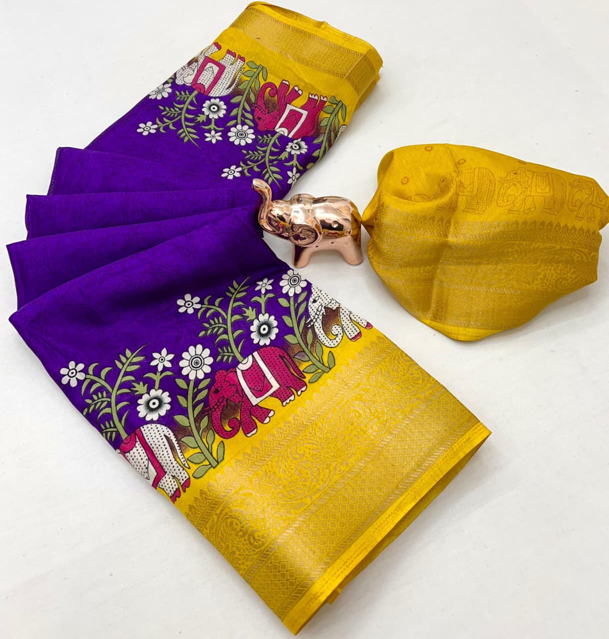 Poly Silk Saree – Floral Print & Golden Border.
