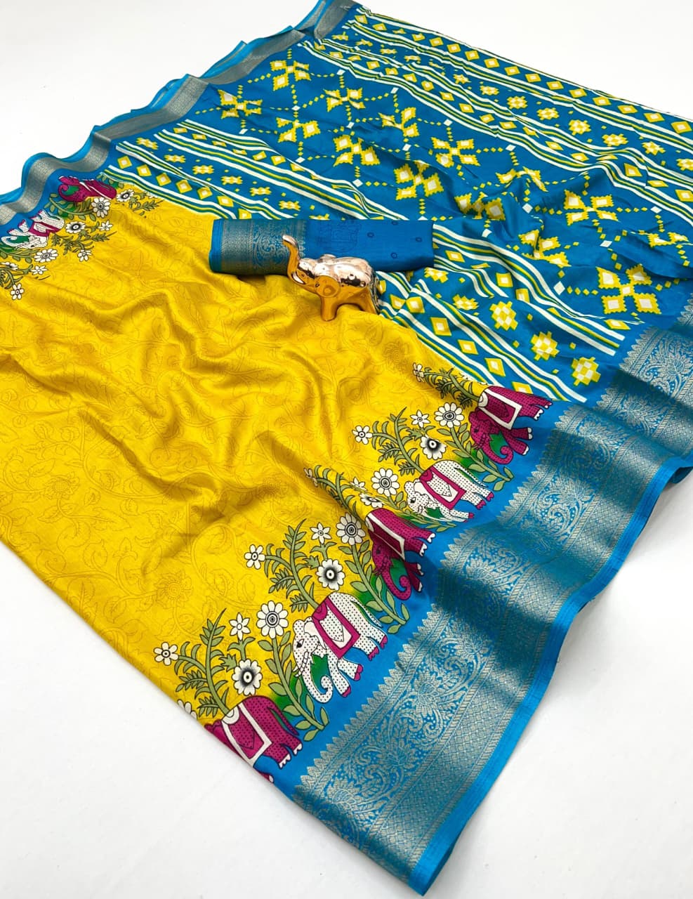 Poly Silk Saree – Floral Print & Golden Border.