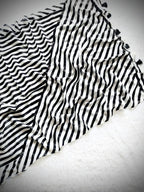 Heavy Marshmallow Georgette Saree – Black & White Digital Print with Cotton Tassels.