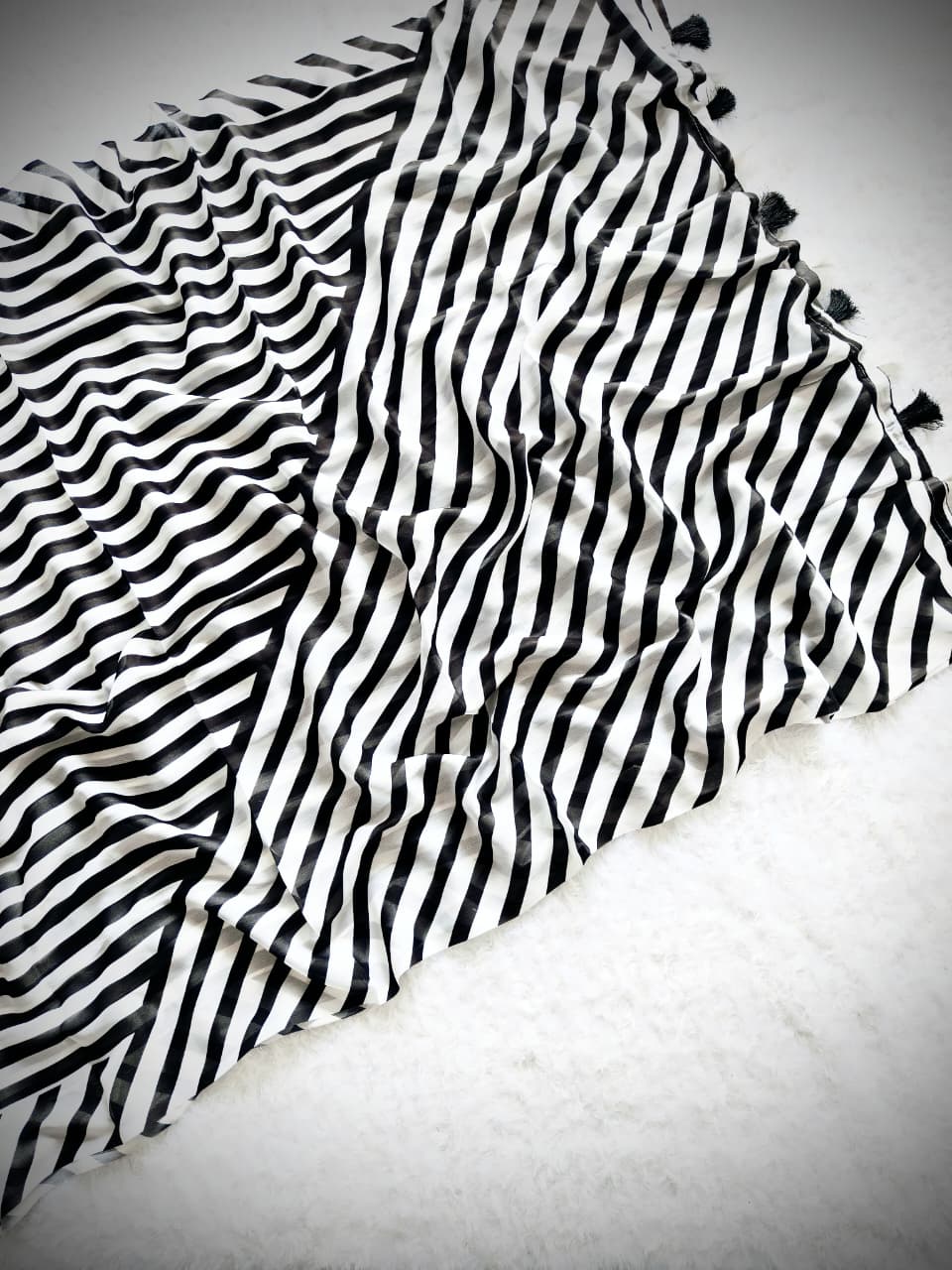 Heavy Marshmallow Georgette Saree – Black & White Digital Print with Cotton Tassels.