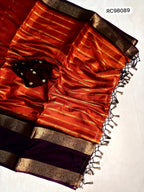 Soft Dola Silk Saree – Dark Fenta Dust Uniform with Jacquard Patta & Hamsa Zari Borders.