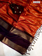Soft Dola Silk Saree – Dark Fenta Dust Uniform with Jacquard Patta & Hamsa Zari Borders.