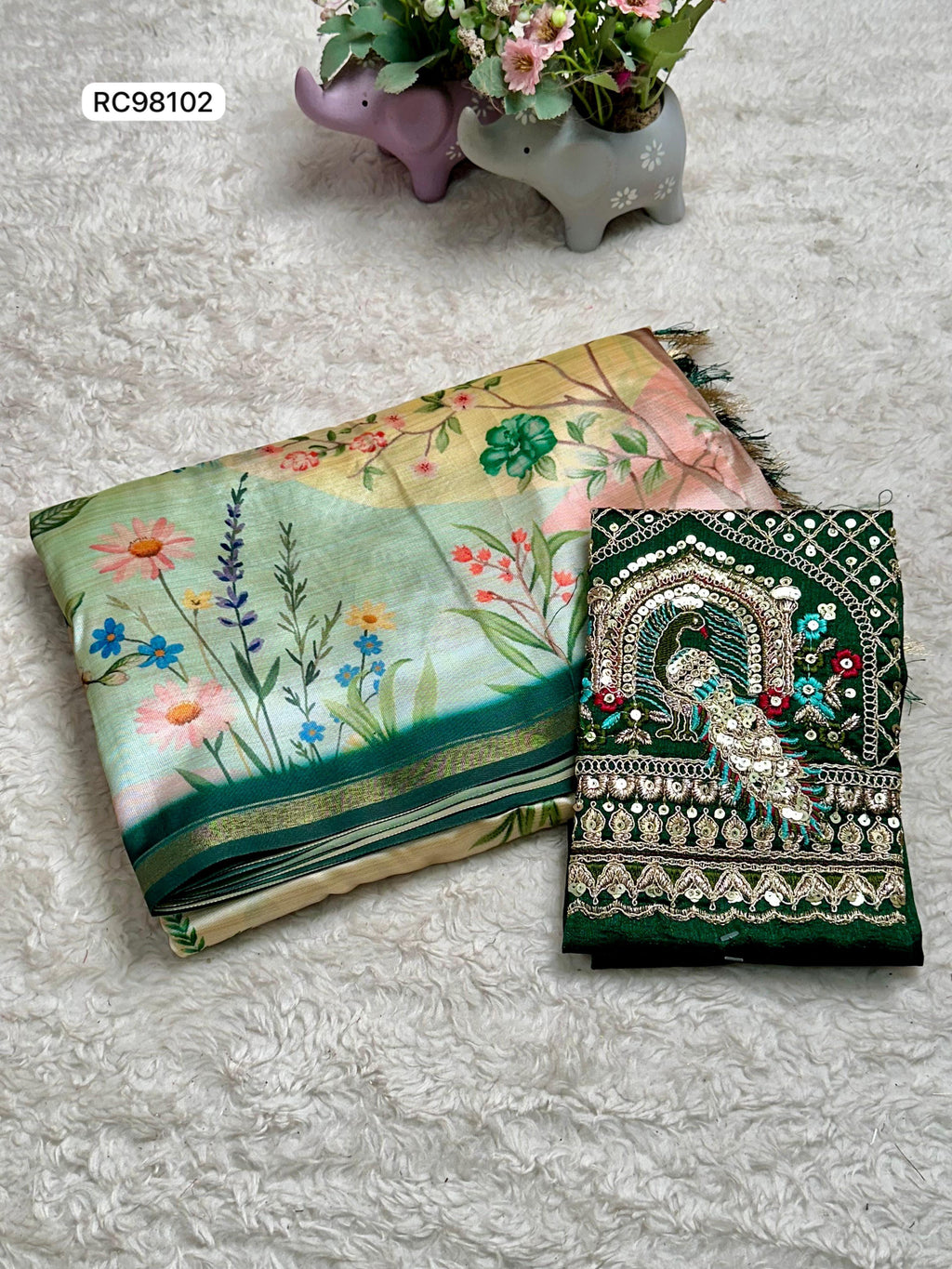 Opulent Malai Silk Saree Featuring Peacock & Floral Motifs.