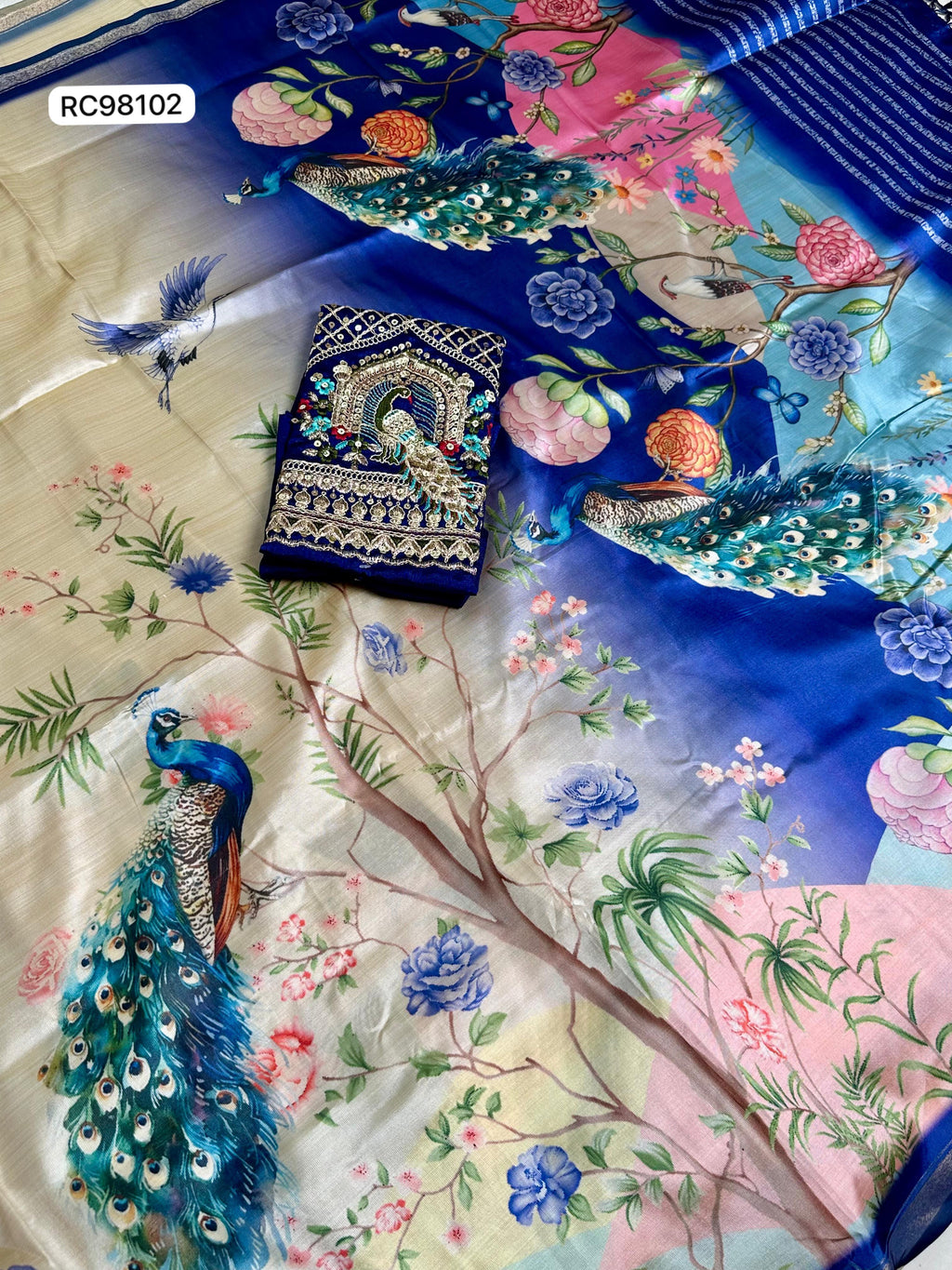 Opulent Malai Silk Saree Featuring Peacock & Floral Motifs.