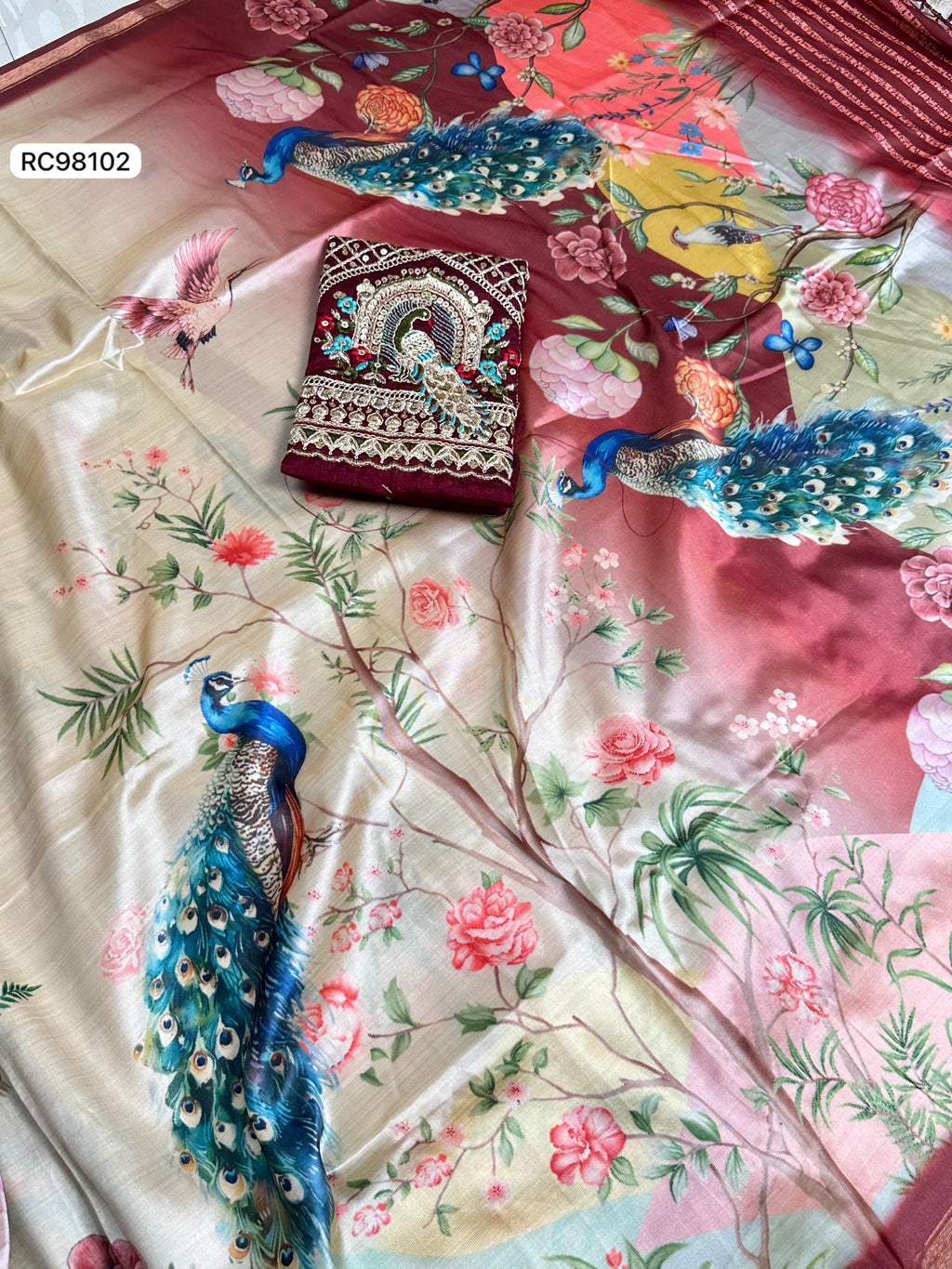 Opulent Malai Silk Saree Featuring Peacock & Floral Motifs.